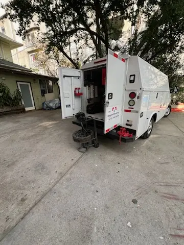 Magnet Plumbing service vehicle on-site for Water Heater Repair in East Lakeside